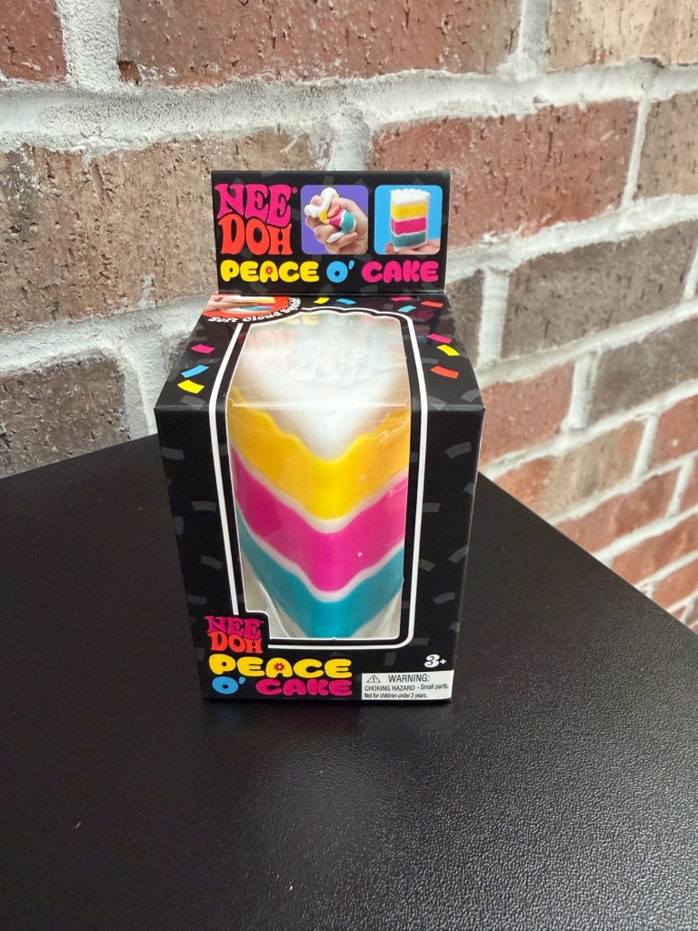 NeeDoh Peace O' Cake Layered Rainbow Stress Toy - White, Yellow, Pink, Blue